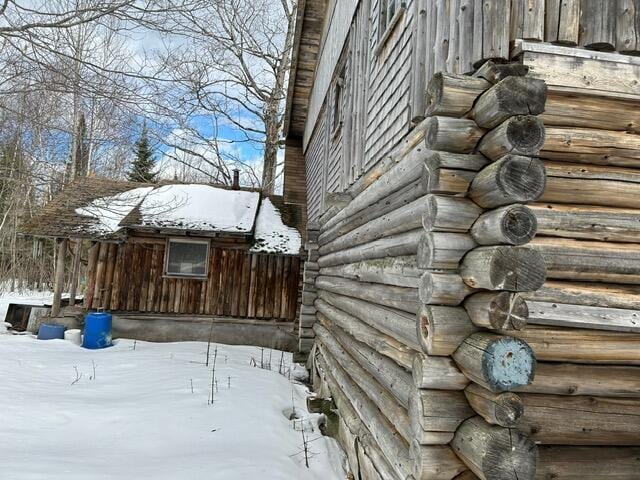 view of snow covered property