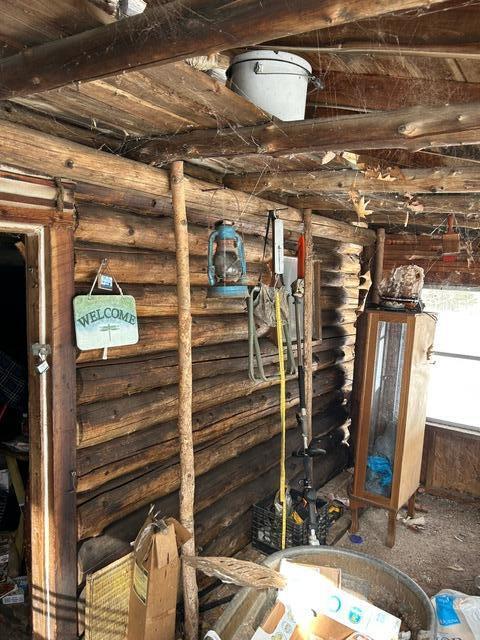 interior space featuring rustic walls