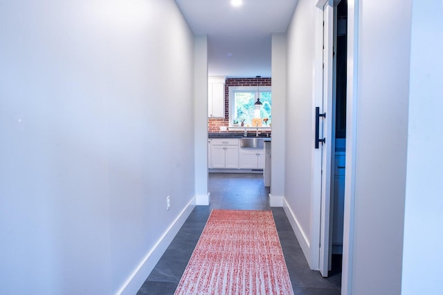 hallway featuring sink