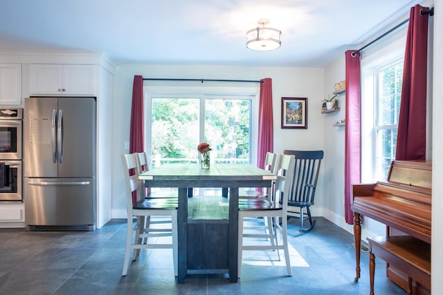 dining space with a wealth of natural light