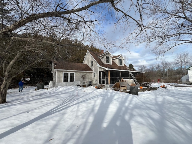 exterior space featuring a sunroom