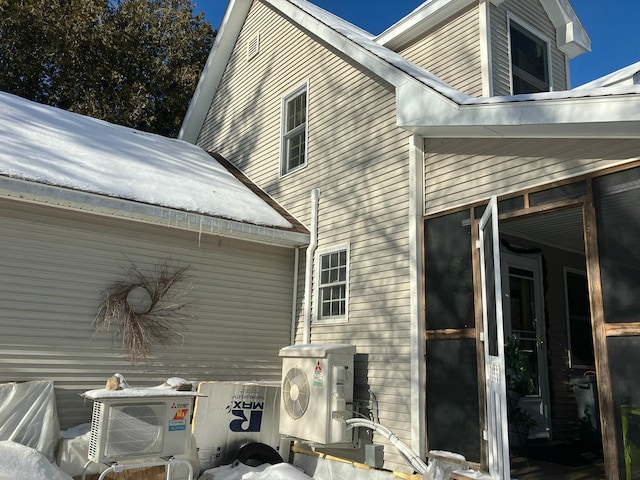 rear view of house with ac unit