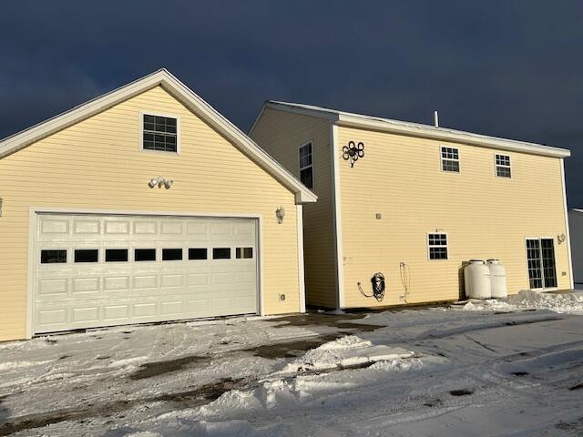 exterior space featuring a garage