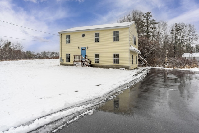 view of snow covered property