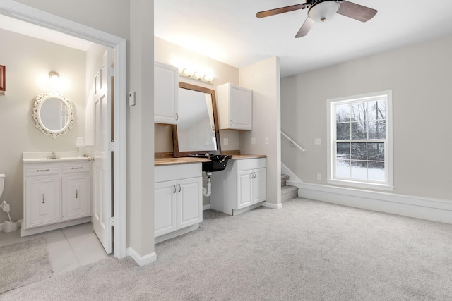 bathroom with vanity and ceiling fan