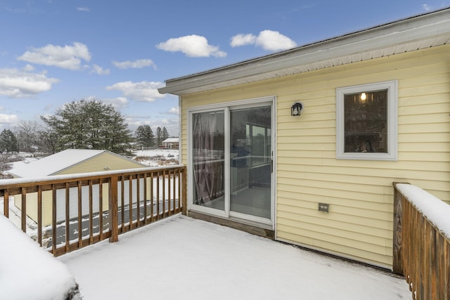 view of snow covered deck