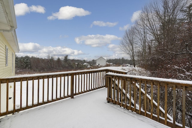 view of snow covered deck