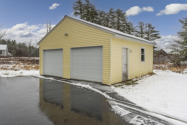 view of snow covered garage