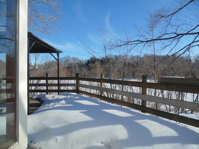 view of snow covered deck