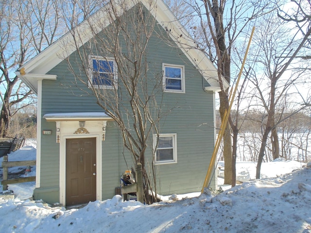 view of snow covered property