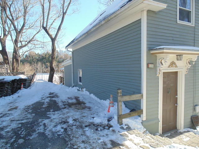 view of snow covered property