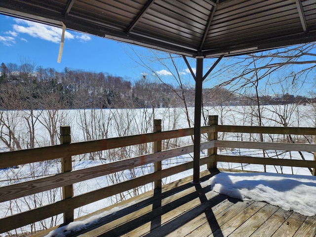 view of snow covered deck