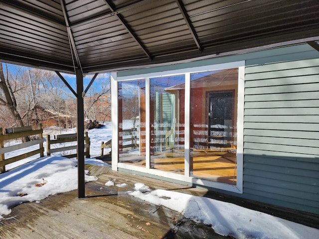 view of snow covered deck