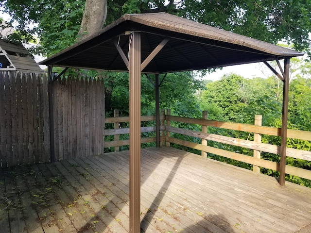 329 Hancock St, Bangor, ME 04401 - wooden deck featuring a carport