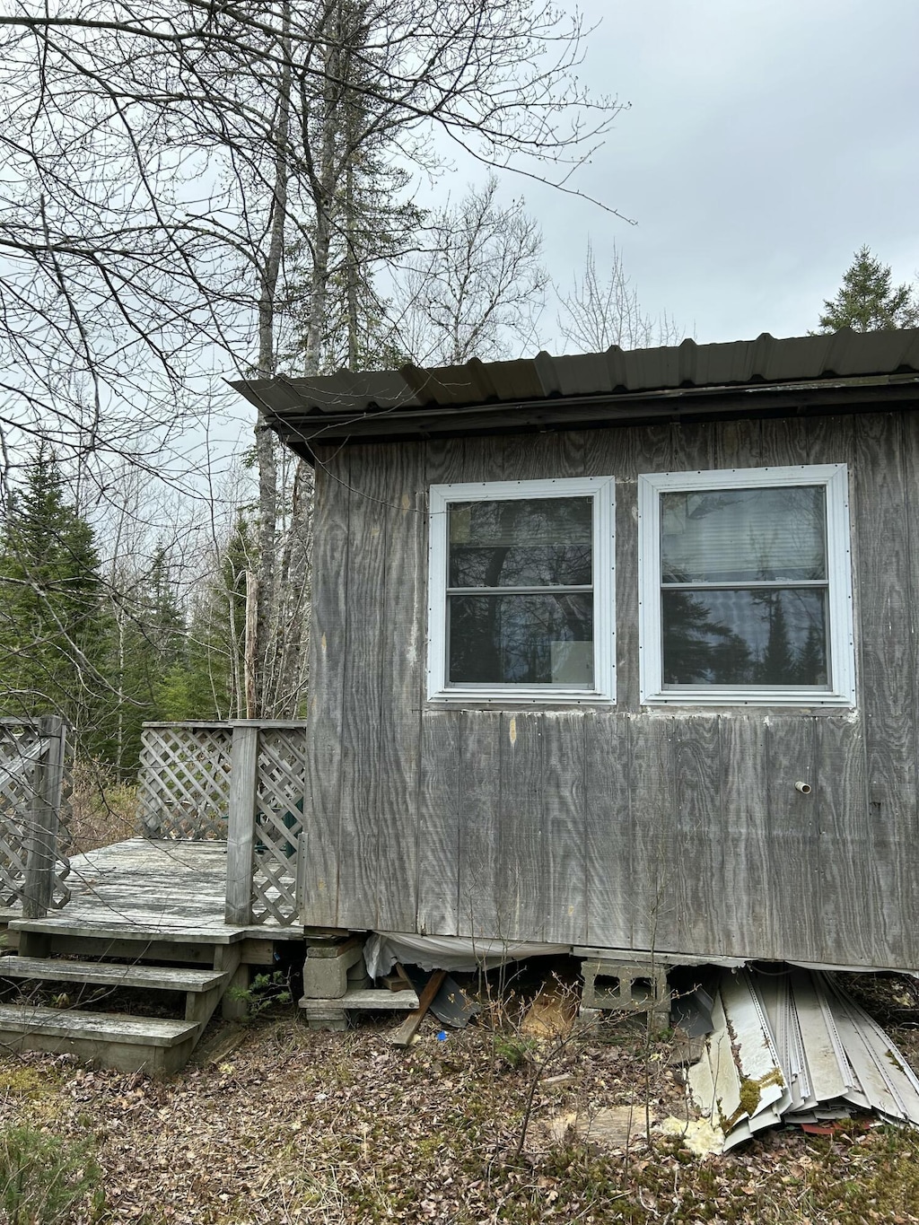 view of home's exterior with a deck