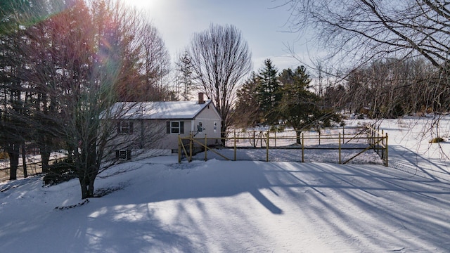 view of yard layered in snow