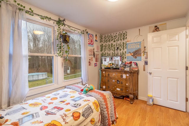 bedroom featuring light hardwood / wood-style floors