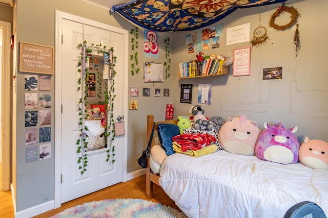 bedroom featuring wood-type flooring