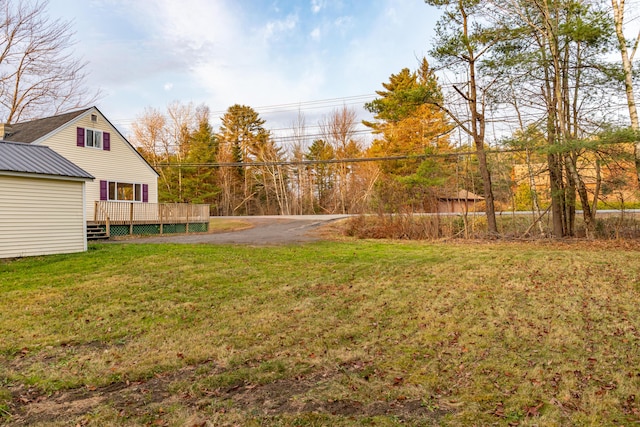 view of yard with a deck