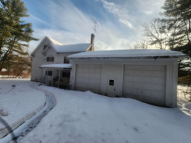 exterior space featuring a garage