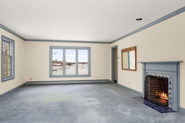 unfurnished living room with a baseboard heating unit, baseboards, ornamental molding, and a tiled fireplace