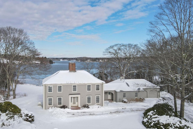 view of front of home with a chimney