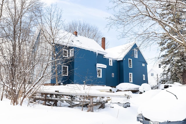 view of snow covered property