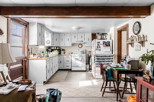 kitchen featuring white appliances, beam ceiling, light hardwood / wood-style flooring, and white cabinets