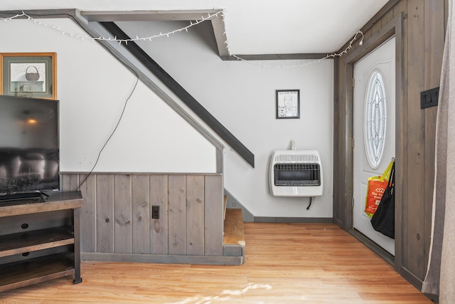 interior space featuring heating unit and light wood-type flooring