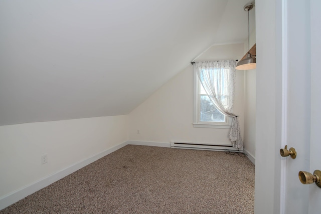 additional living space with carpet, lofted ceiling, and baseboard heating