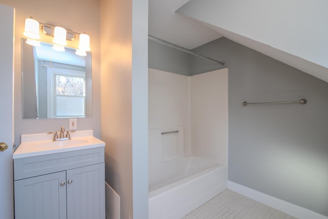 bathroom with vanity, tile patterned floors, and shower / bathing tub combination