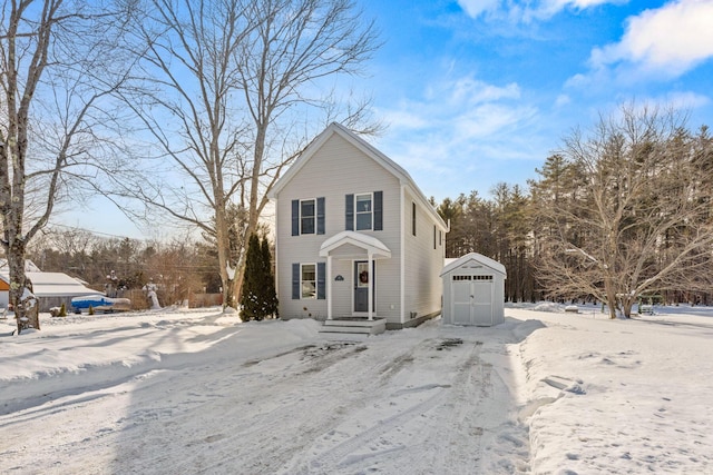 front of property with a shed