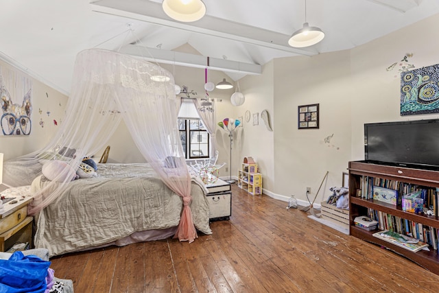 bedroom with vaulted ceiling with beams, wood finished floors, and baseboards