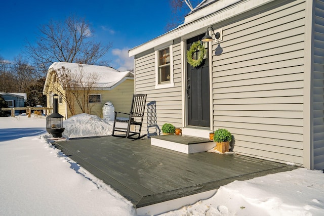 view of snow covered deck