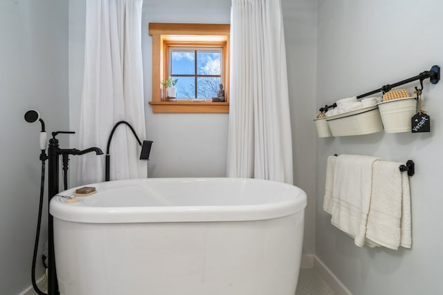 bathroom with a bathing tub