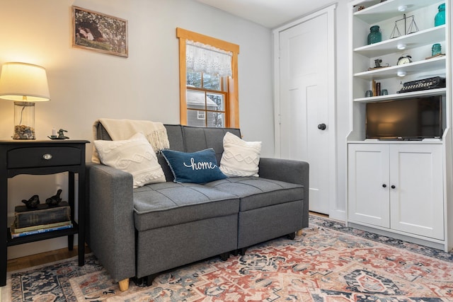 living room with light hardwood / wood-style flooring