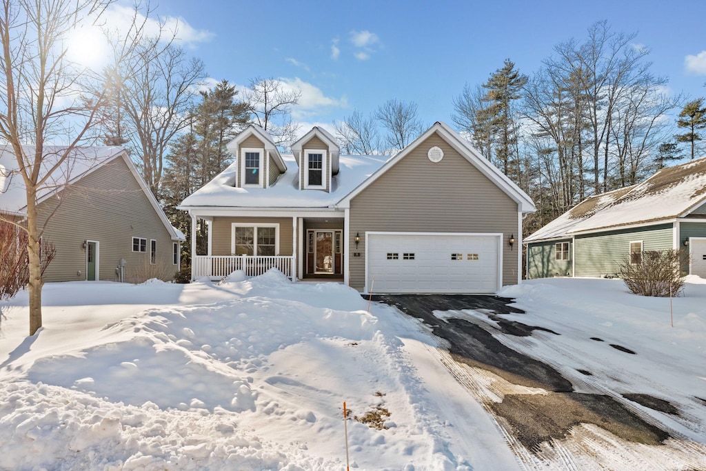 8 Marathon Ave Unit 8, Gorham, ME 04038 - new england style home featuring a porch and a garage