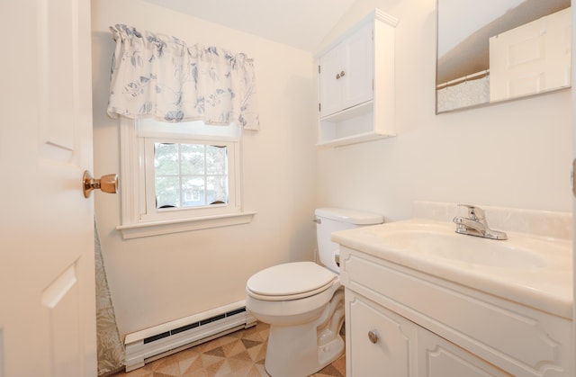 full bath featuring toilet, a baseboard radiator, and vanity