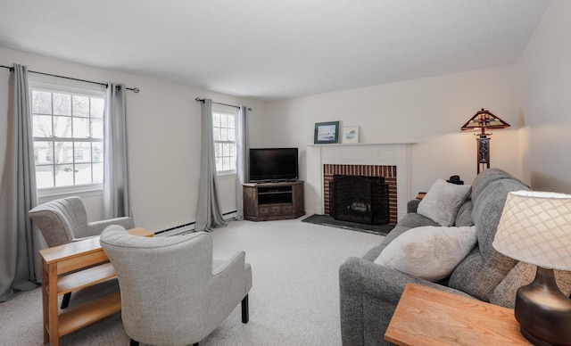 living room with a baseboard radiator, a fireplace, and carpet flooring