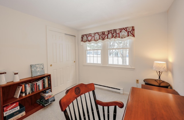 carpeted bedroom with a baseboard radiator and a closet