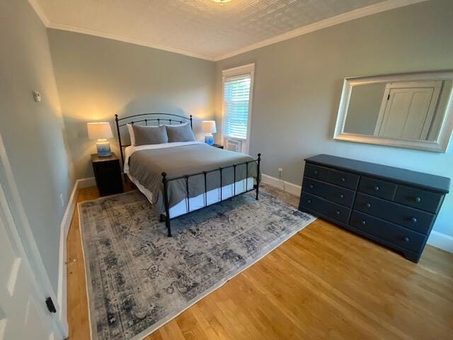 98 Fountain St, Bangor, ME 04401 - bedroom featuring crown molding and hardwood / wood-style floors