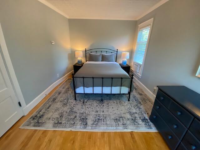 98 Fountain St, Bangor, ME 04401 - bedroom featuring hardwood / wood-style flooring and crown molding