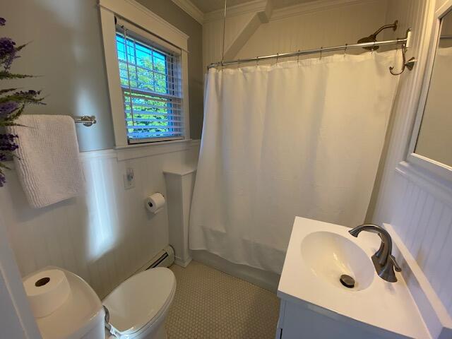 98 Fountain St, Bangor, ME 04401 - full bathroom featuring vanity, ornamental molding, shower / tub combo, and toilet