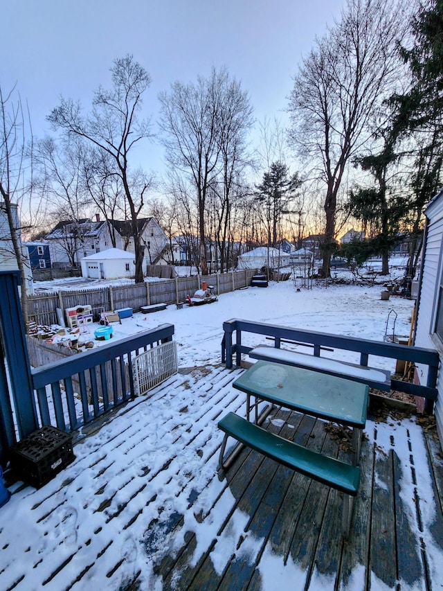 view of snow covered deck