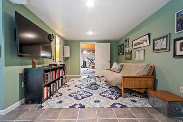 living area featuring tile patterned floors