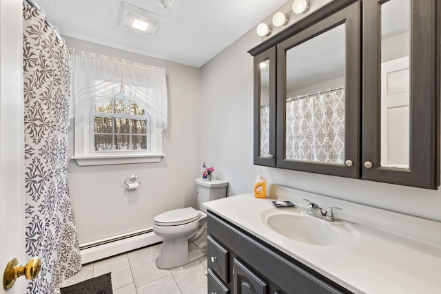 bathroom with vanity, a baseboard radiator, and toilet