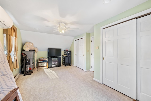 rec room with a wall mounted air conditioner, lofted ceiling, a baseboard heating unit, ceiling fan, and light carpet