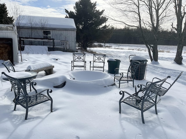 view of snow covered patio