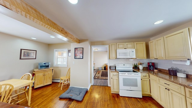 kitchen with light wood-type flooring, decorative backsplash, white appliances, and baseboard heating