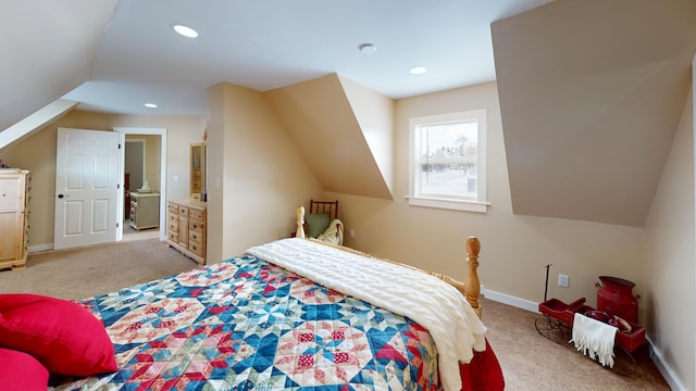 carpeted bedroom with lofted ceiling